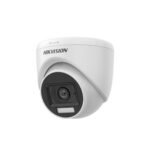 The DS-2CE76D0T-LPFS (2.8mm) is a 2 MP CMOS indoor/outdoor turret camera equipped with a 2.8mm lens providing a 101° horizontal FOV. It supports Smart Hybrid Light technology, offering up to 20 meters of both IR and white light night vision. The camera also includes a built-in microphone for audio recording over coaxial cable and supports multiple video formats (TVI, AHD, CVI, CVBS). With Digital WDR and 2D DNR, it ensures clear images even in challenging lighting conditions. The camera operates in temperatures ranging from -40°C to 60°C and is ideal for versatile security applications.